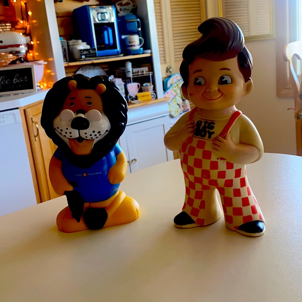 Vintage big boy plastic doll bank. And BMO Harris Bank plastic lion bank